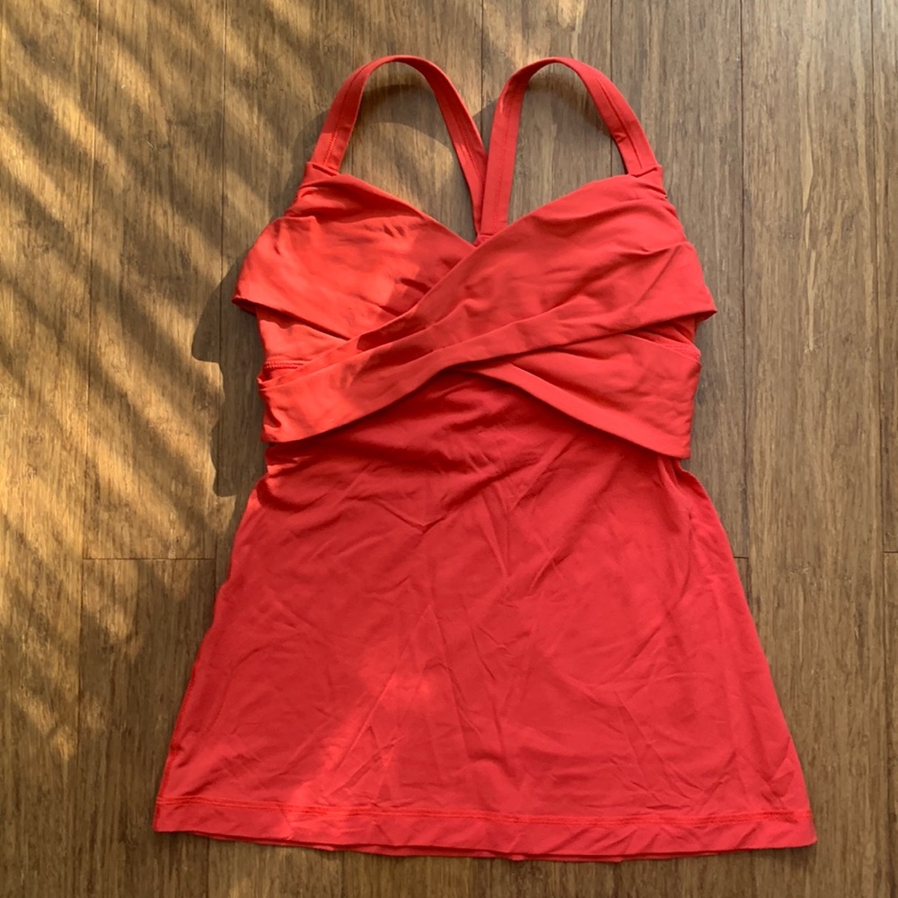 Vibrant Lululemon tank top with built-in bra. Cross-cross front.
